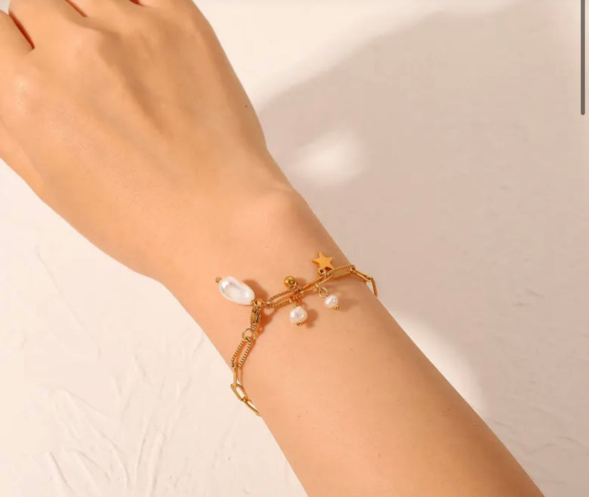 Gold Paperclip bracelet with freshwater pearls and star dangles