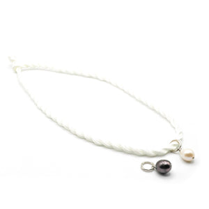 Freshwater pearl on coloured cord