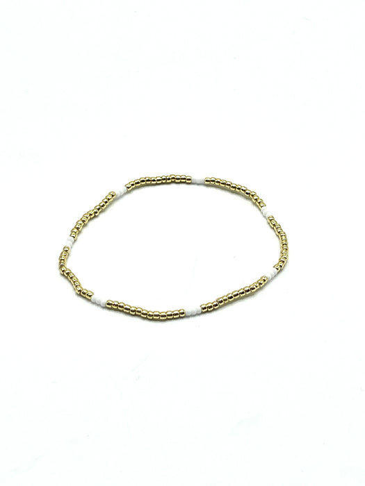 Gold and white stretchy love bead bracelet