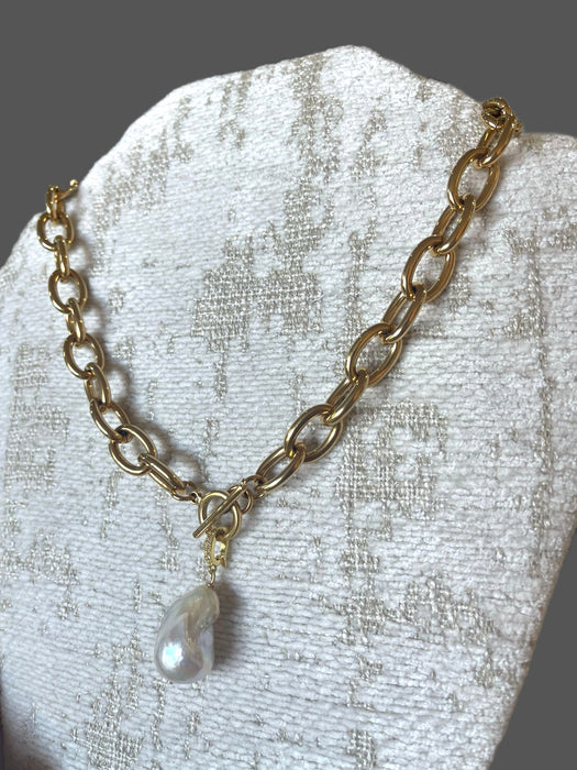 Power necklace with detachable pearl pendant