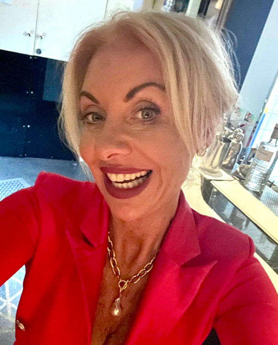 Power necklace with detachable pearl pendant