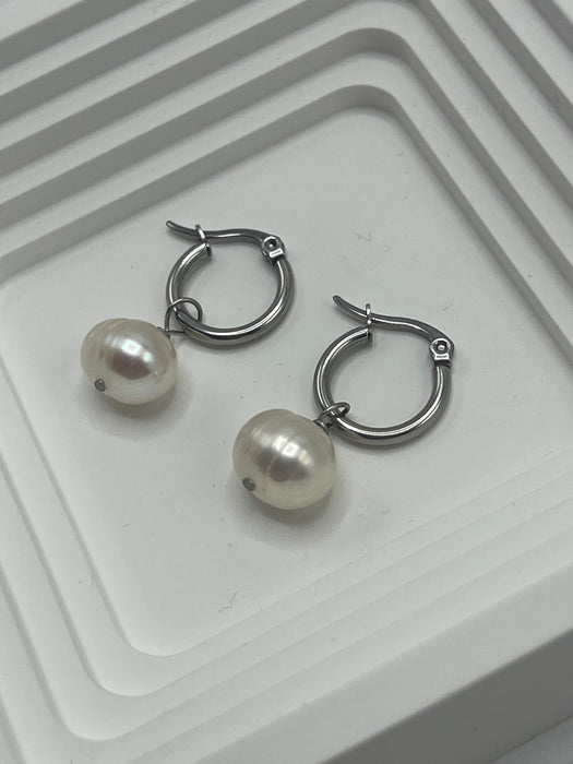 Hoop earrings with large chubby barrel pearl