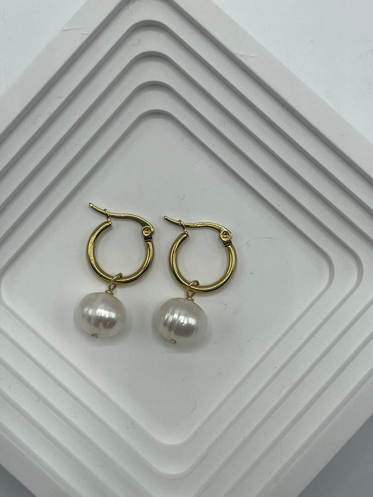 Hoop earrings with large chubby barrel pearl