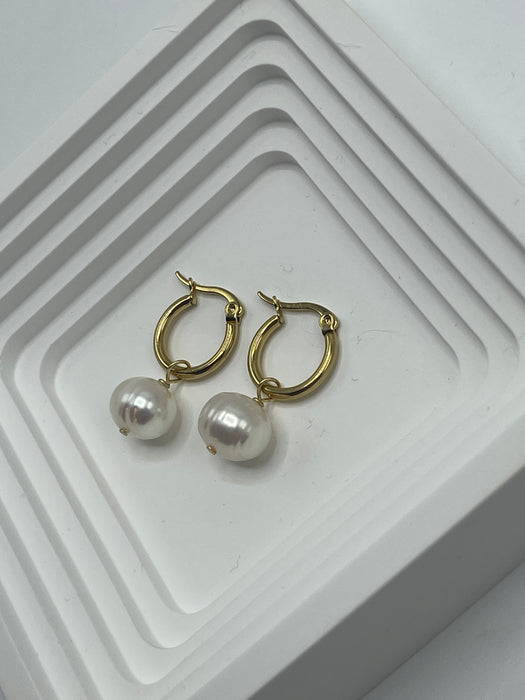 Hoop earrings with large chubby barrel pearl